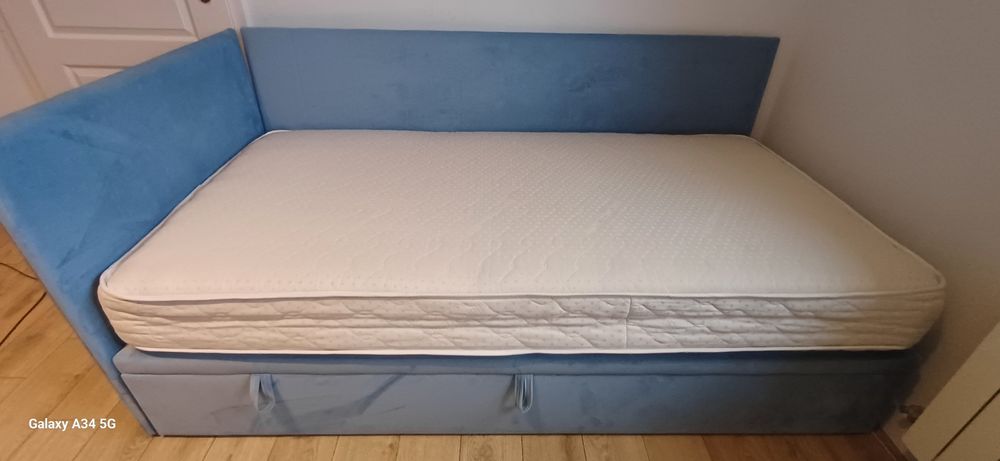 Łóżko tapicerowane niebieskie 100x200