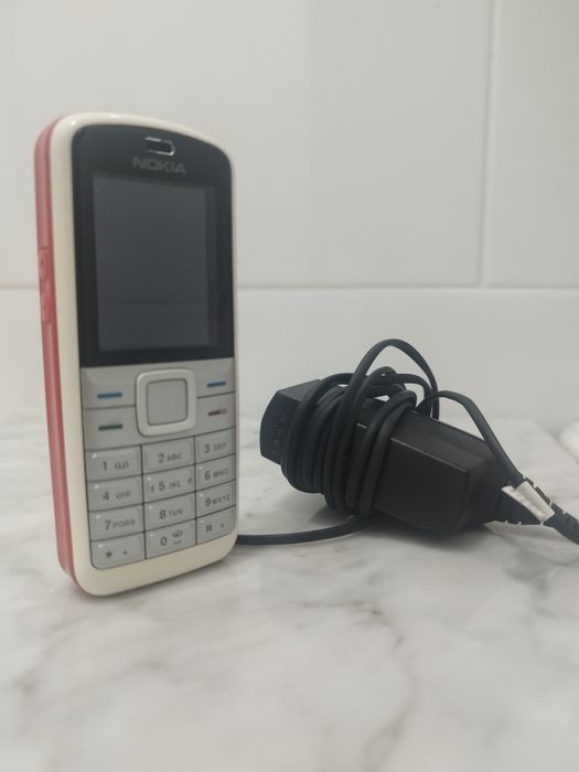 Nokia 5070 + carregador (para peças)
