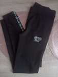 Czarne legginsy Plein S/M lampasy logo
