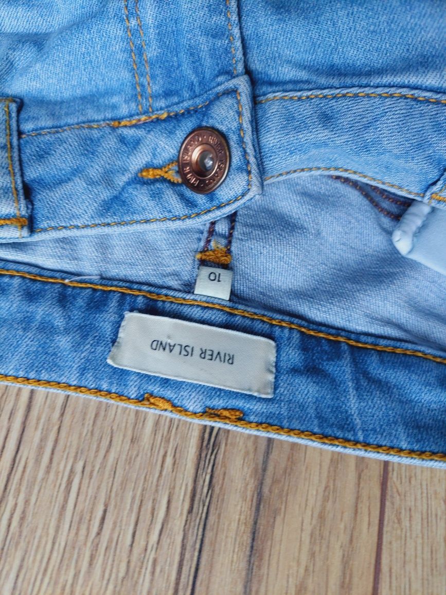 Jasnoniebieskie dżinsy przecierane skinny river island 38