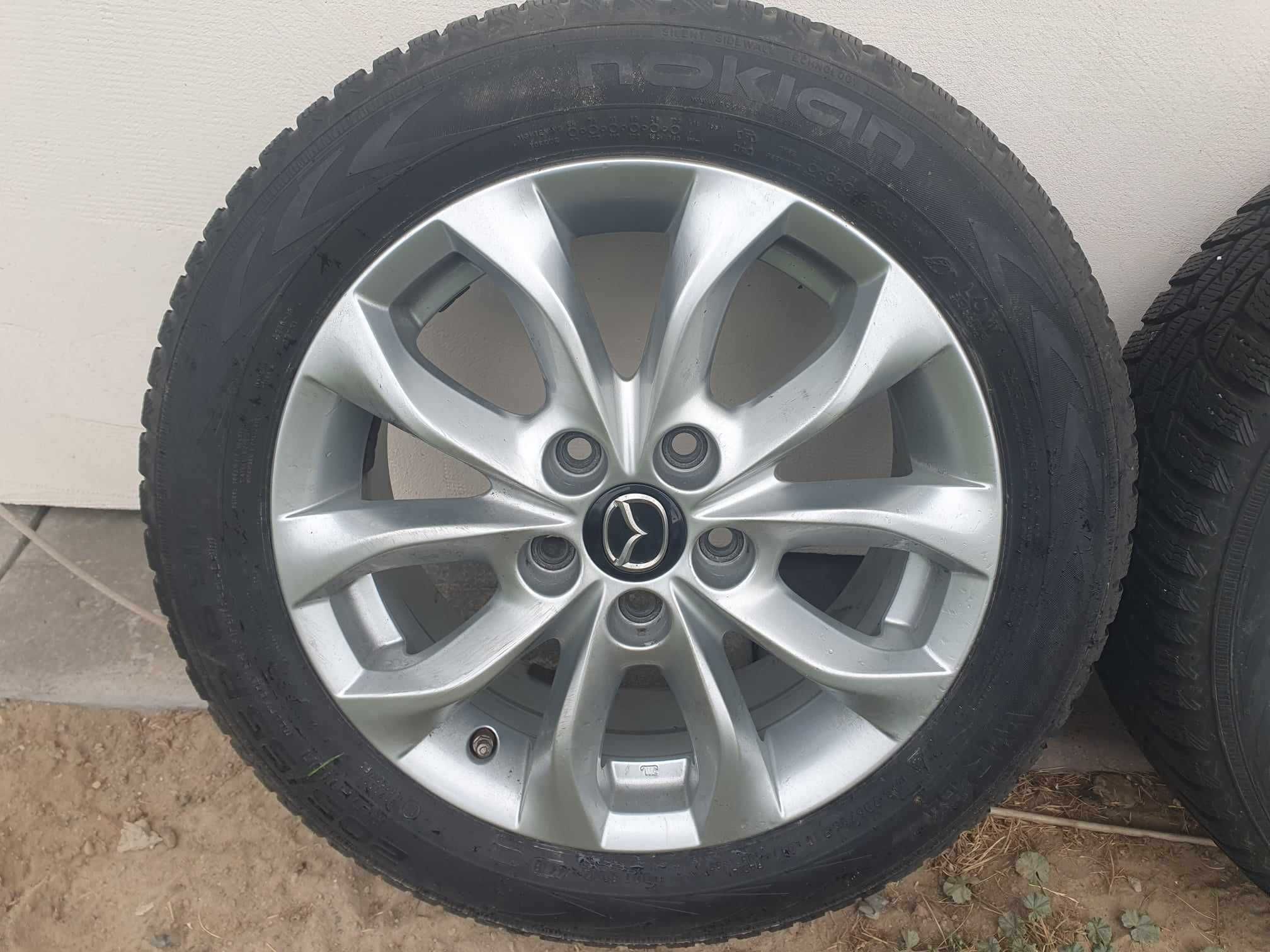 Komplet opon zimowych z felgami Mazda 205/55/R16 NOKIAN WR d4