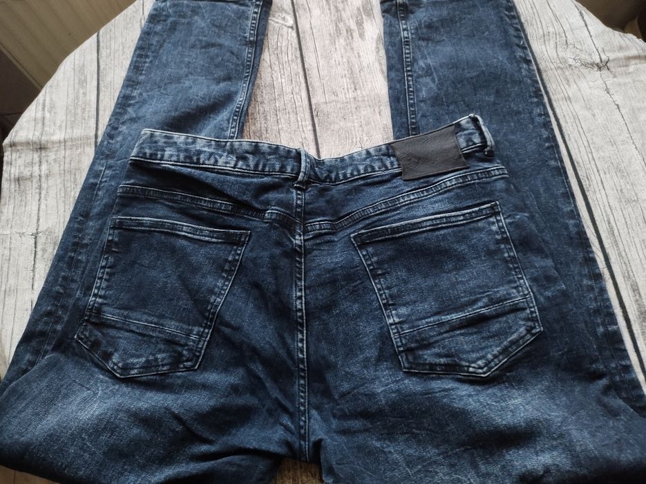 Authentic supply jeansy męskie z dziurami