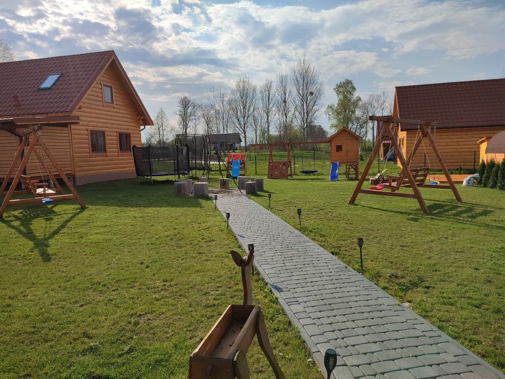 Domki na Mazurach caloroczne,sauna i jacuzzi łódka plac zabaw.