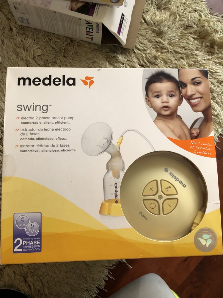 Молокоотсос Medela