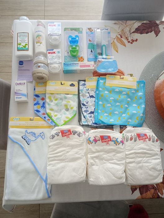 Wyprawka dla noworodka pampersy delicol smoczek butelka puder oliwka