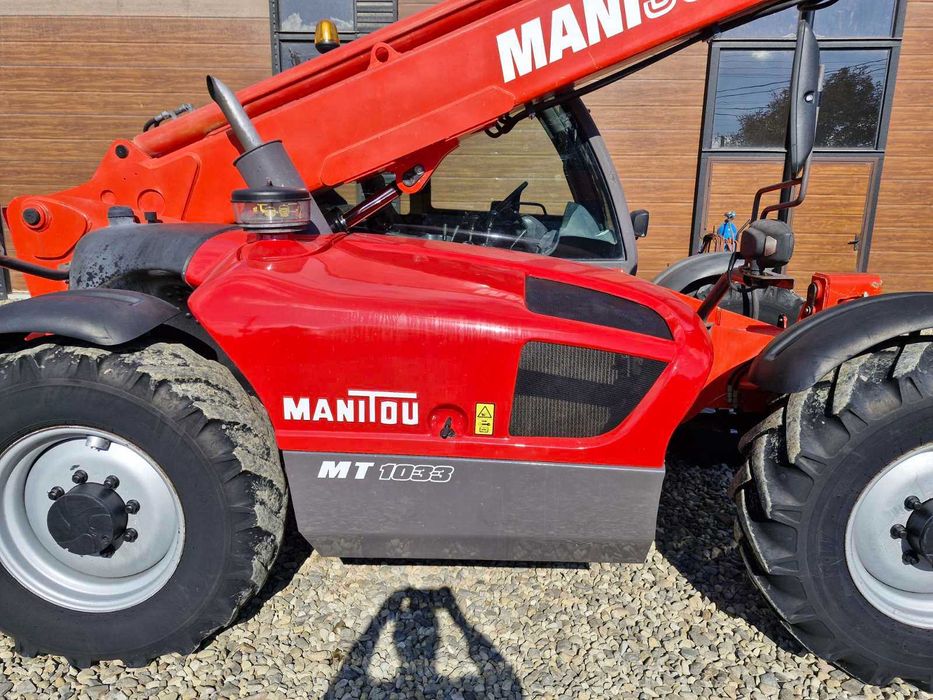 телескопічний навантажувач  MANITAU MT1033
