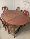 Mesa de jantar redonda extensível em pinho mel maciço