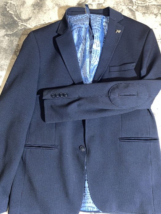 Мужской пиджак,б/у,состояние нового