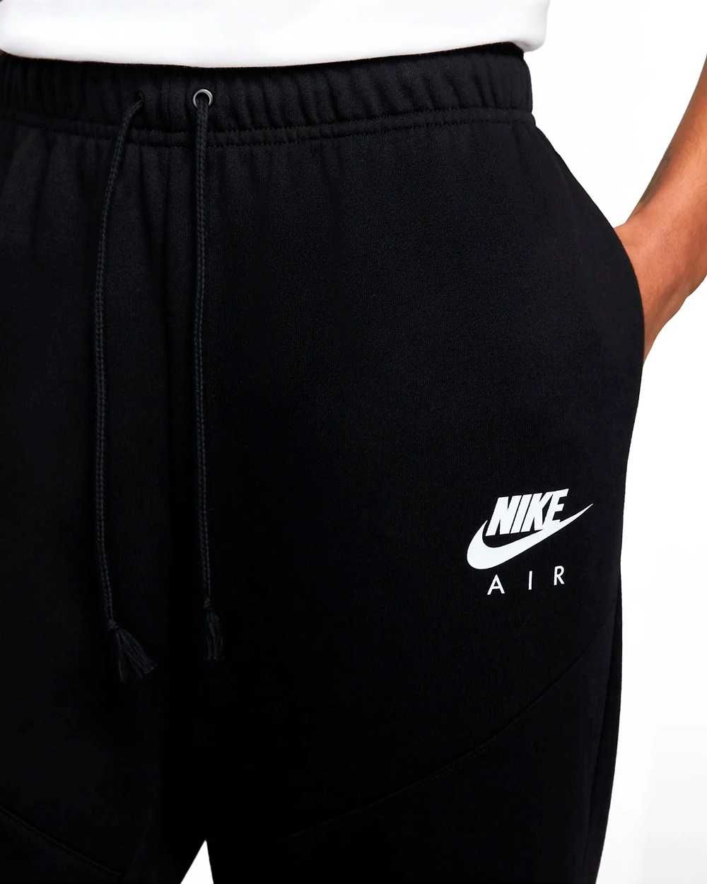 Damskie spodnie dresowe Nike Air czarne: różne rozmiary