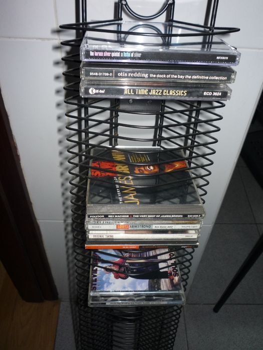 Estante para CD´s+Saco de bebé (para levar fraldas)+ mochila