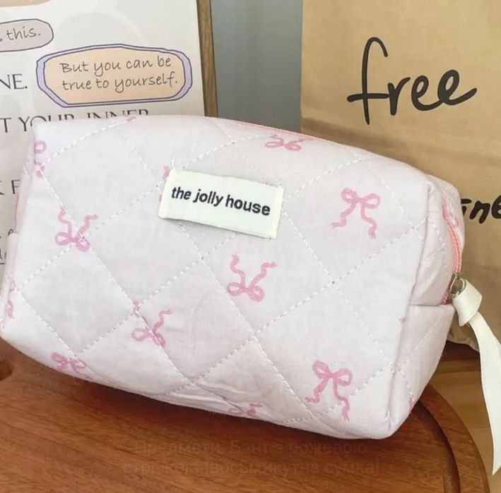 Маленька містка дорожня косметичка з бантом