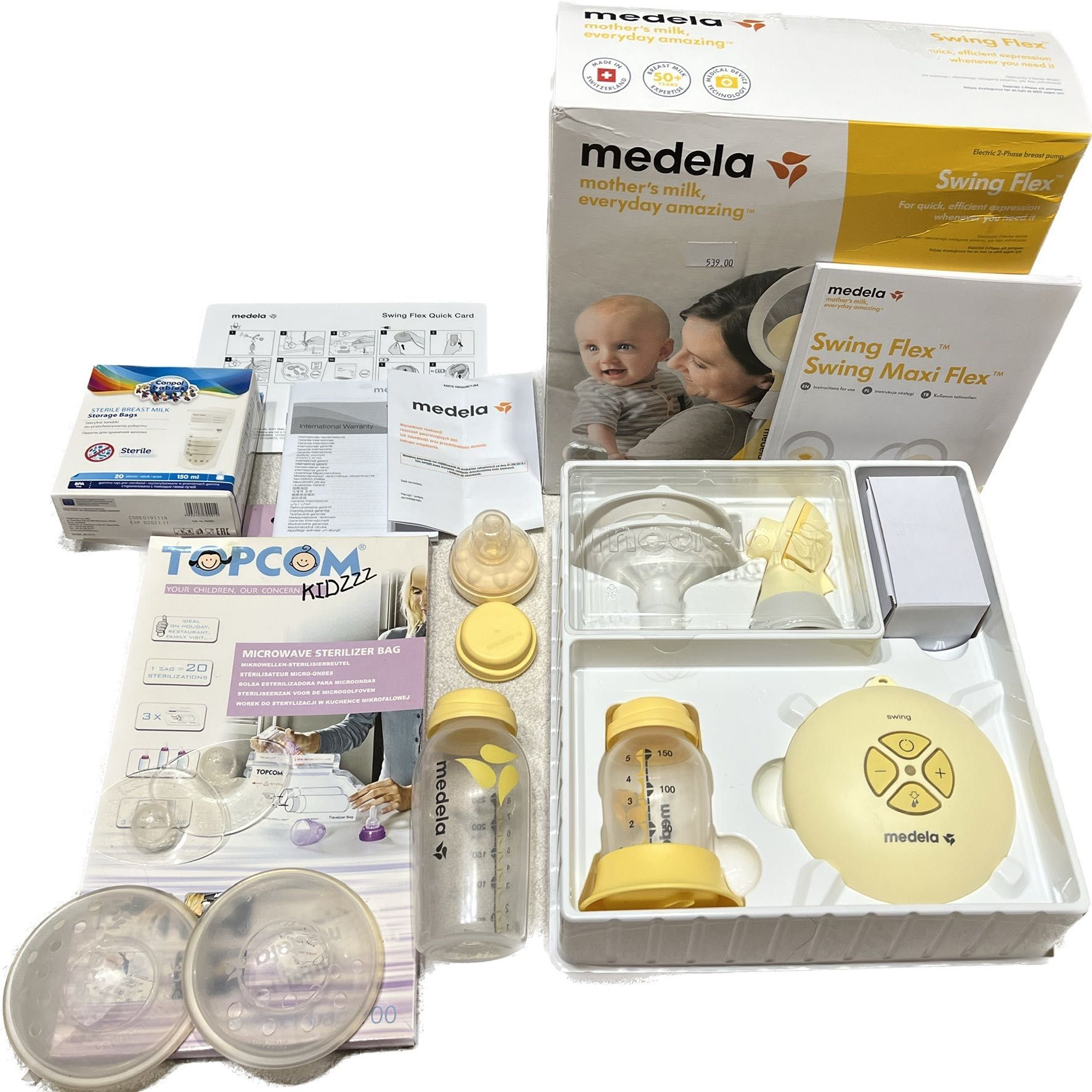 Laktator Medela swing flex + Butelka Medela Calma 250 ml + GRATISY