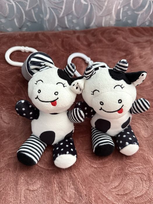 Іграшки на коляску