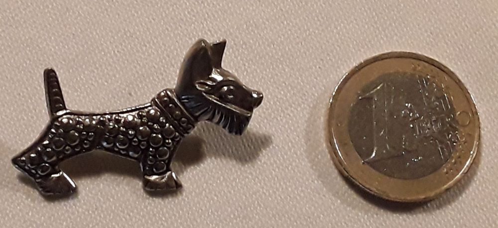 Pregadeira antiga Fox Terrier