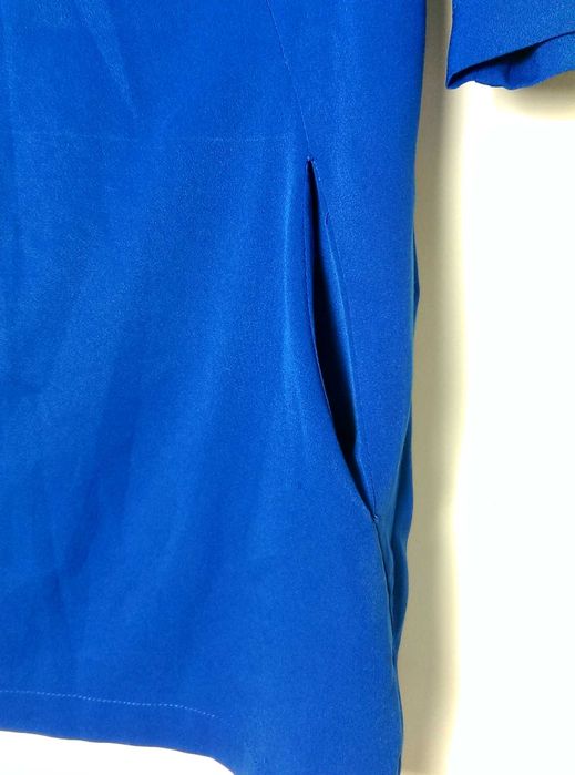 Zwiewna niebieska bluzka krótki rękaw Diverse S