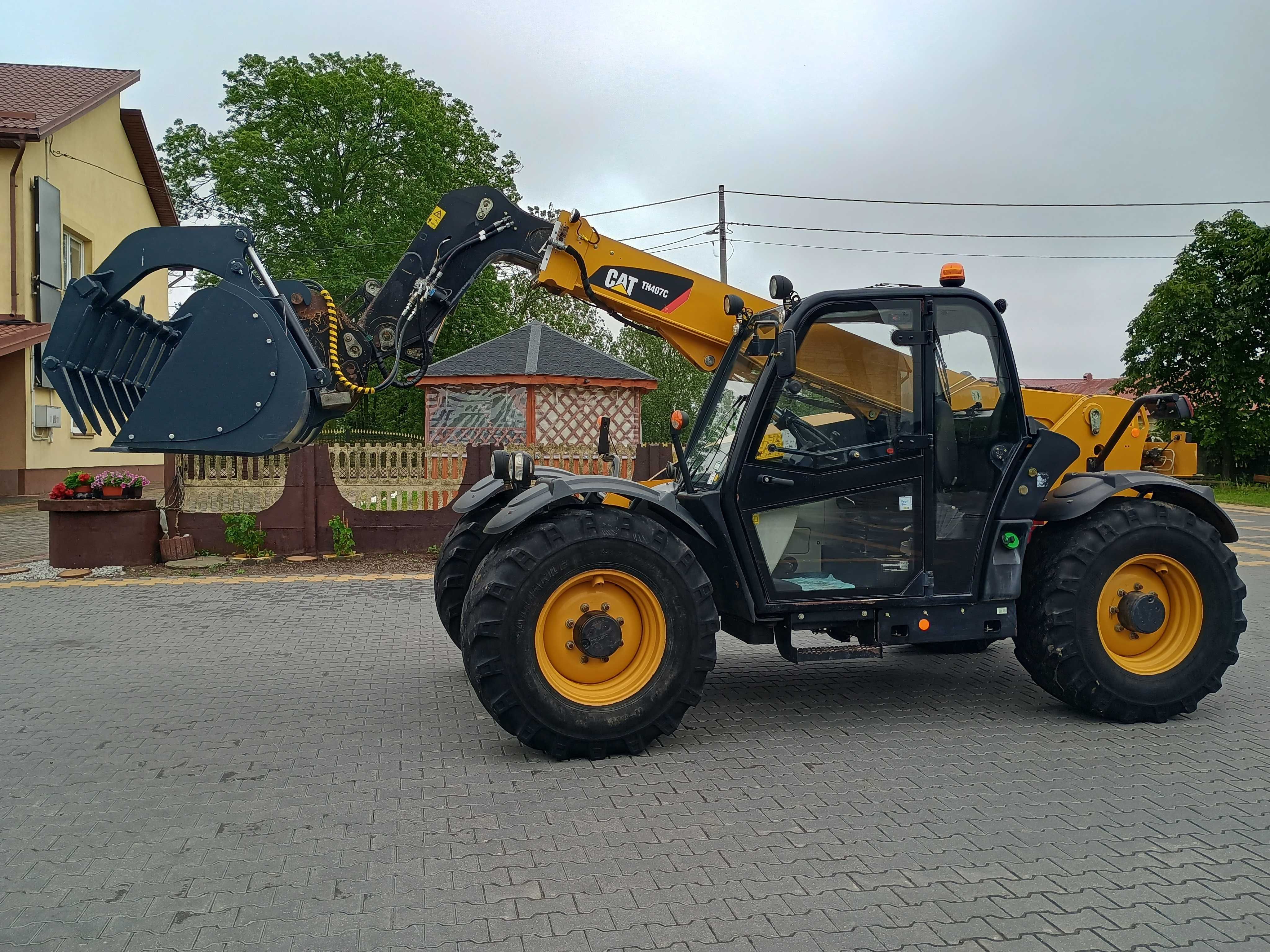 Ładowarka teleskopowa Caterpillar CAT TH 407 rok 2014