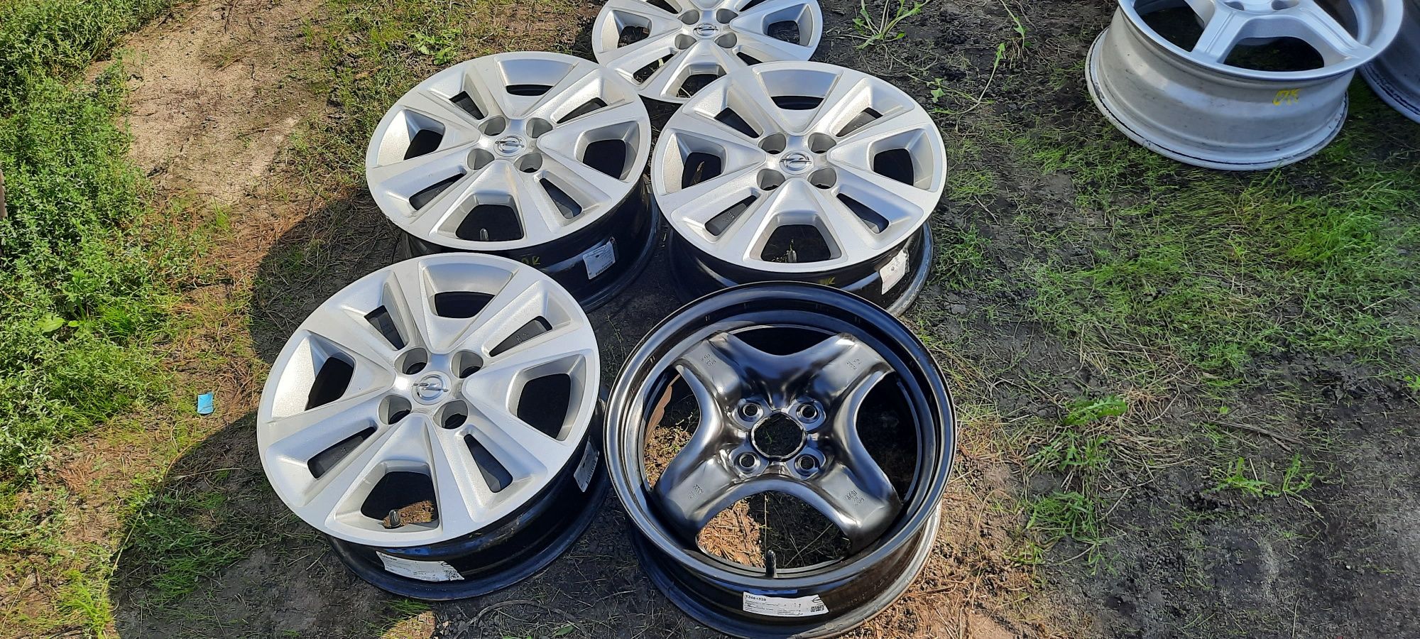 Felgi 15" Opel 4x100 oryginalne zestaw kołpaki czujnki+Gratis