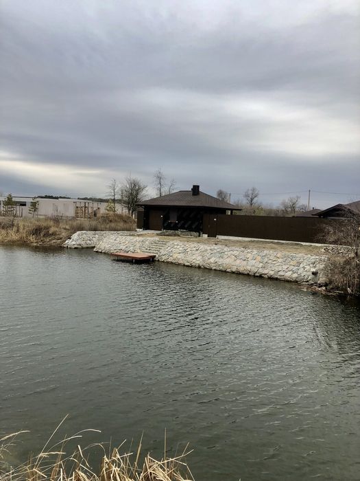 Продам участок в Обуховке со своим берегом в закрытой территории