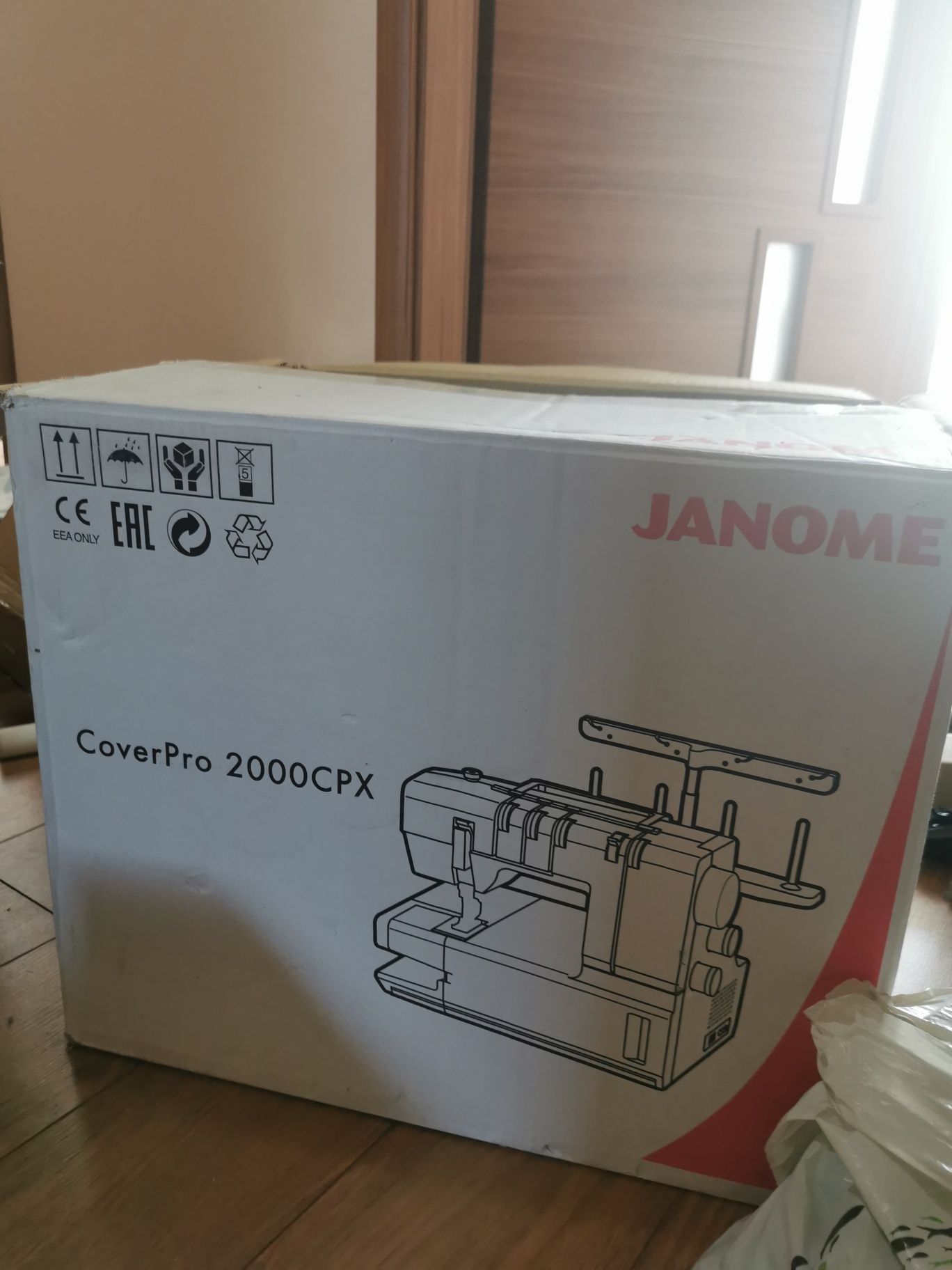 Maszyna coverlok randerka Janome 2000cpx