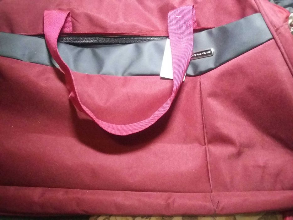 Сумка дорожня велика кольору бордовий