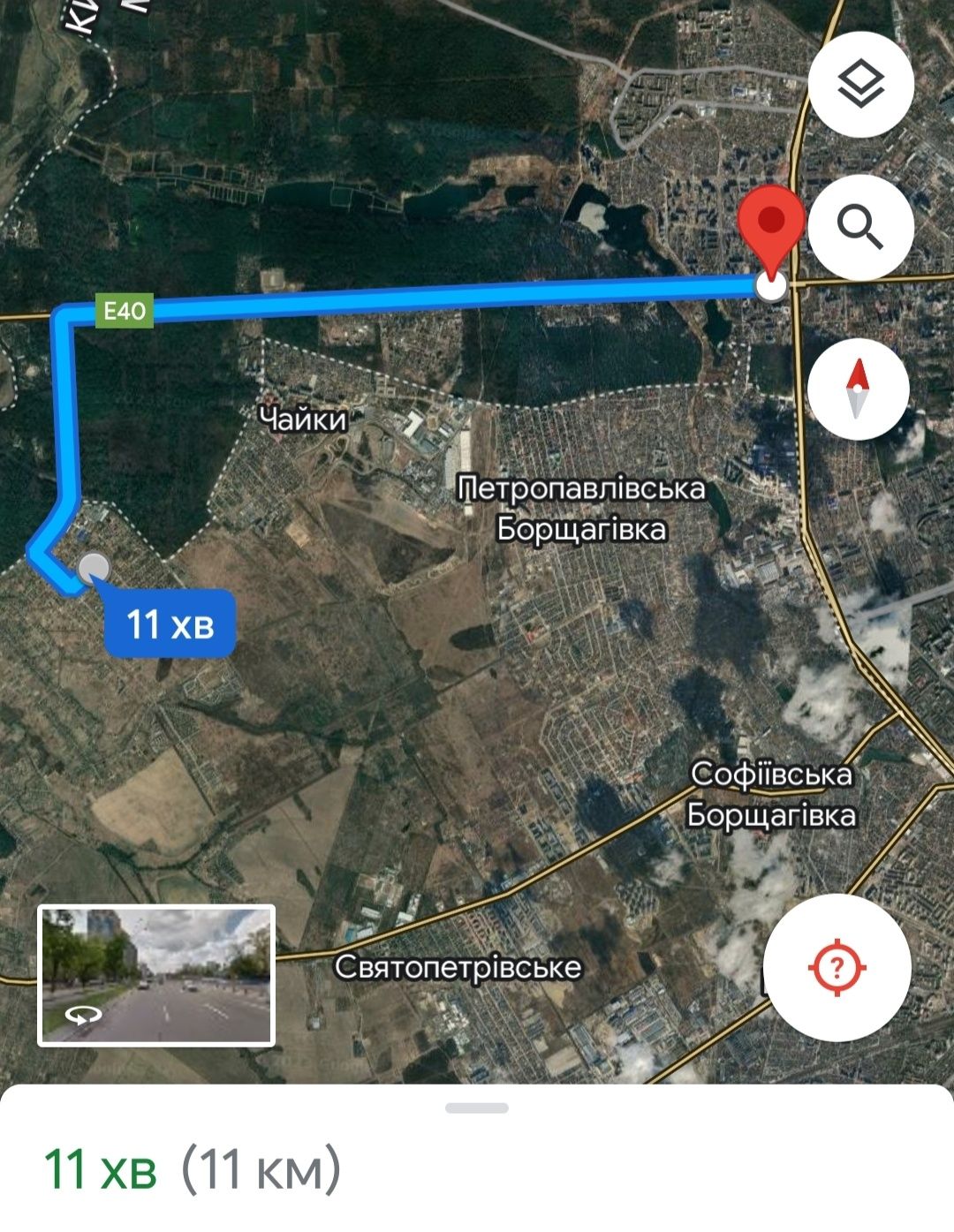 Шевченкове, забудована, асфальтована вулиця. Масив нових будинків.