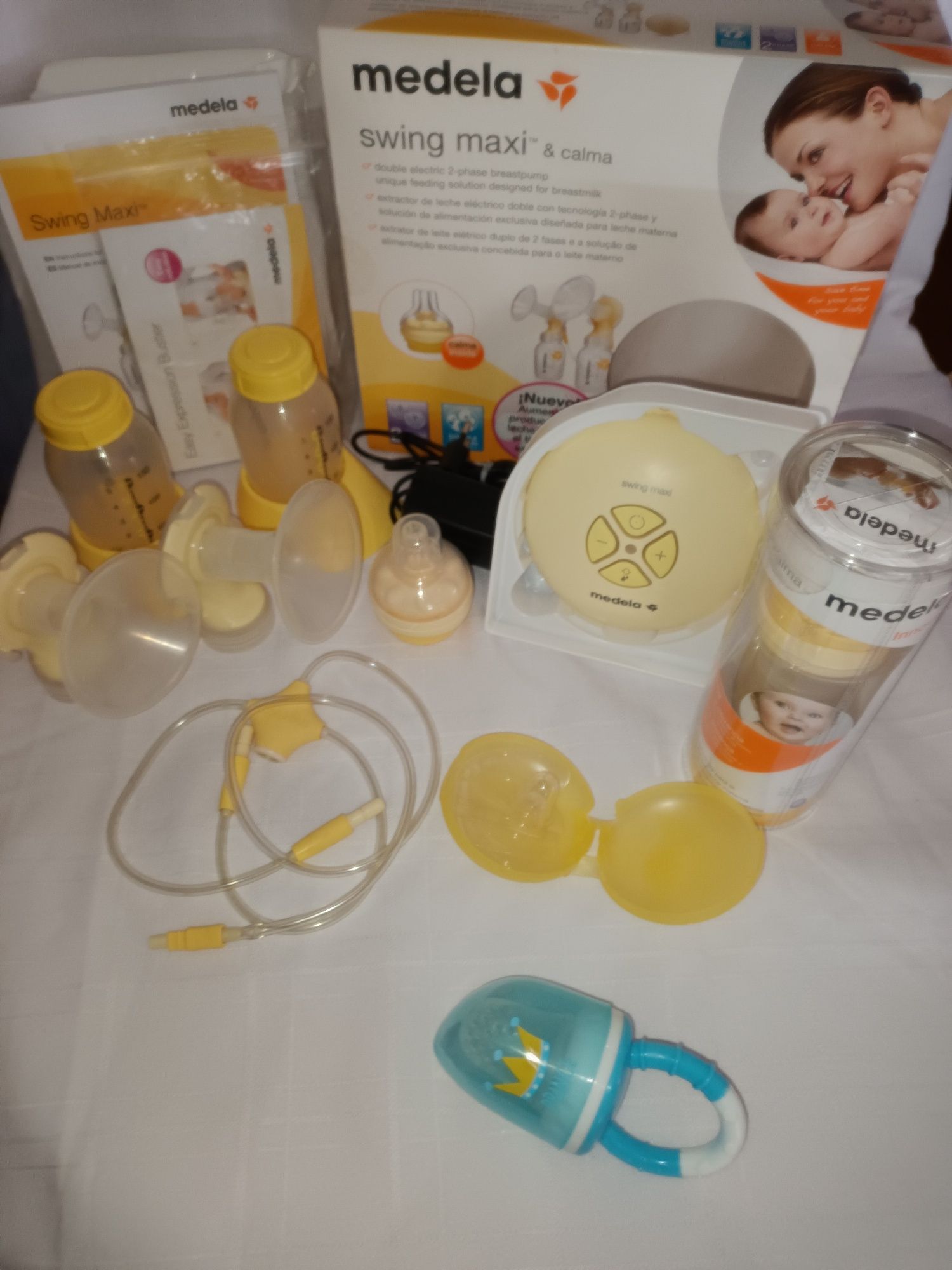 Bomba dupla extrator de leite medela Swing maxi e calma completo com e