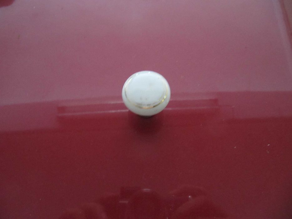 Puxador em cerâmica