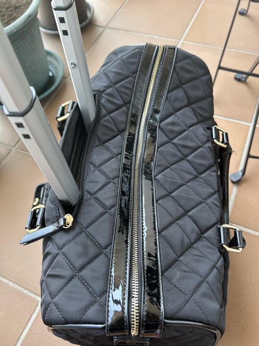 Mala de viagem ou computador Parfois