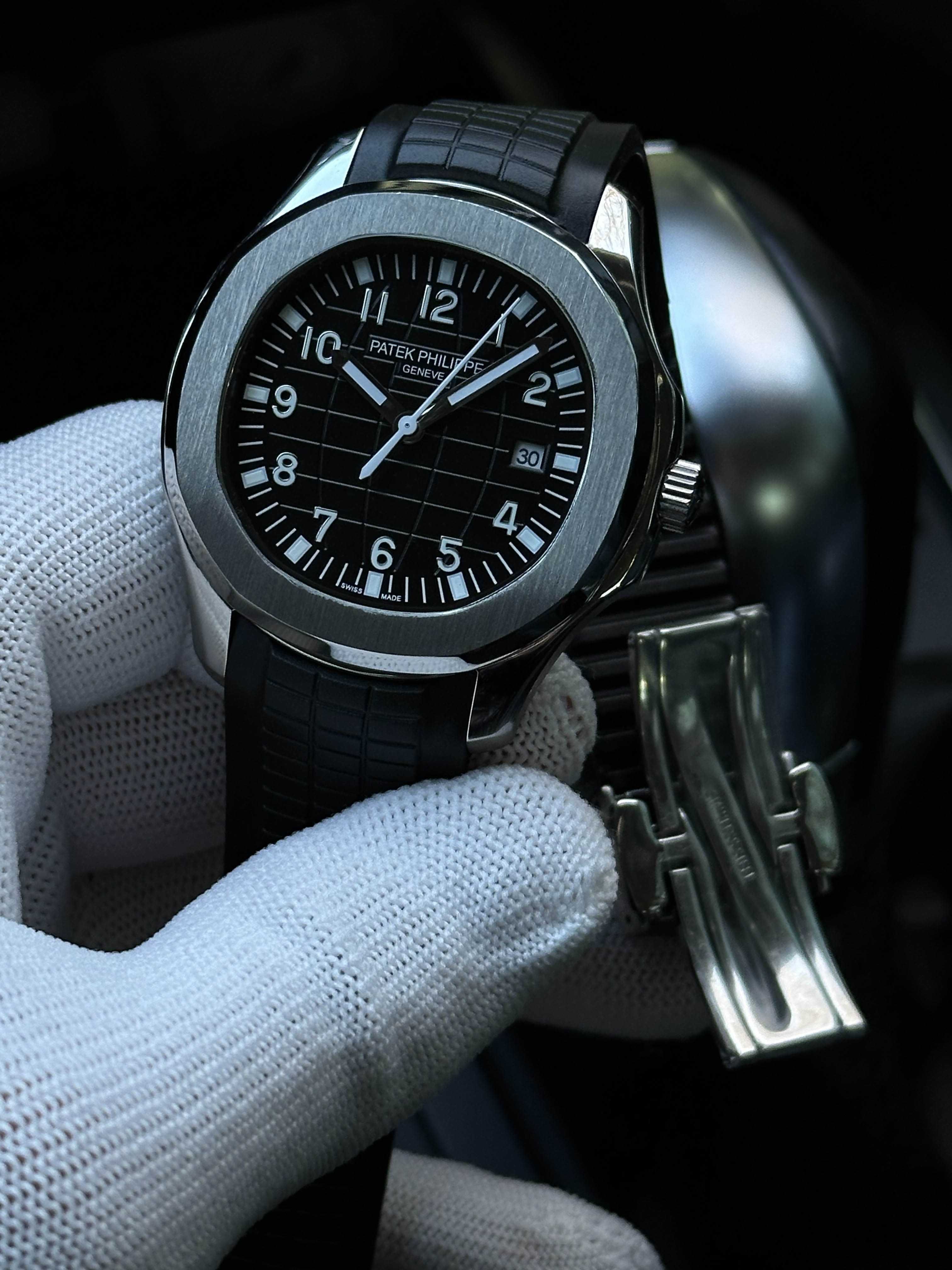 Швейцарские часы Patek Philippe Aquanaut. Механика с автоподзаводом.