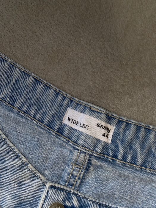 Жіночі джинси кльош