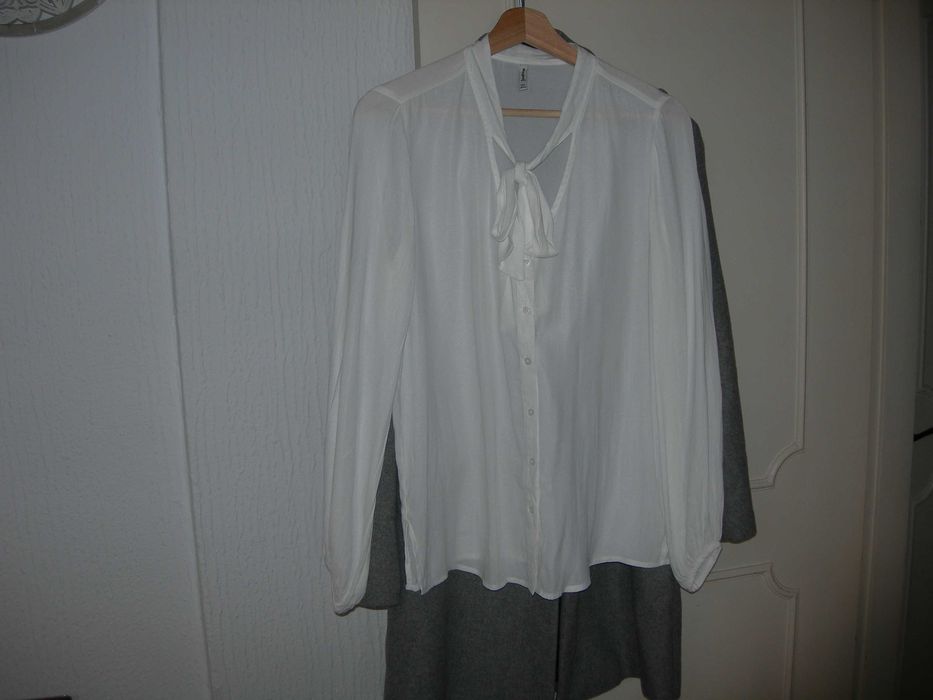 Camisa de Senhora branca.
S / 36 / 8·Bom·Stradivarius