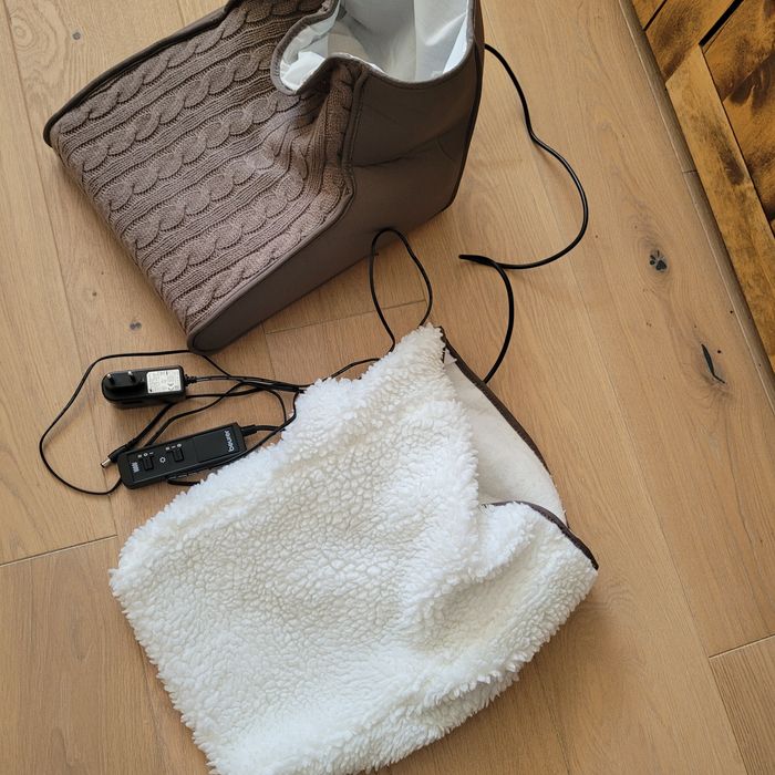 But rozgrzewający z masażerem stóp BEURER