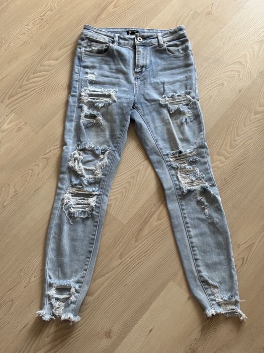 Spodnie jeansy dzinsy z przetarciami s