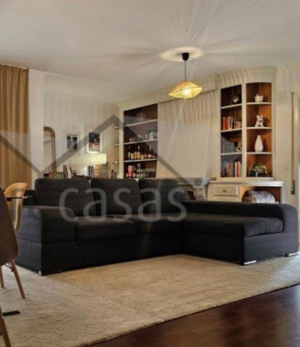 Sofá-cama com chaise longue