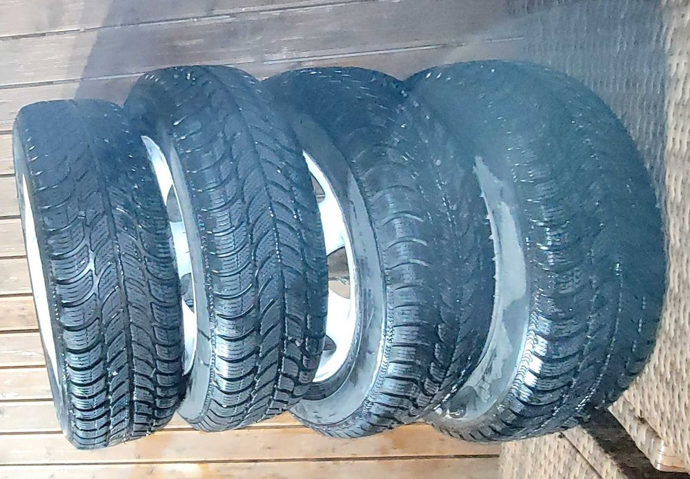 Felgi aluminiowe białe z oponami zimowymi 15 Dębica Frigo 2 185/65 R15