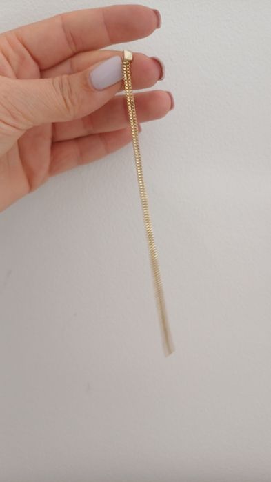 Brincos dourados com pormenor prateado