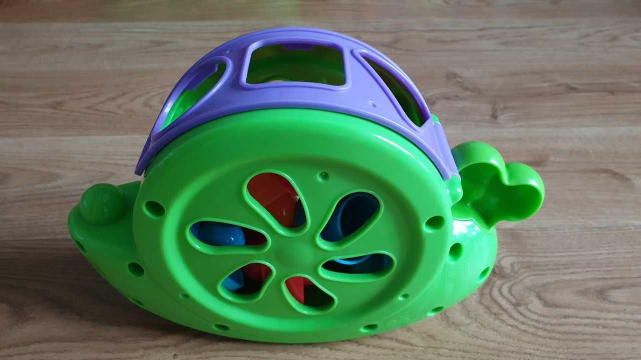 Interaktywny śpiewający ślimak marki Fisher Price - Sorter Kształtów