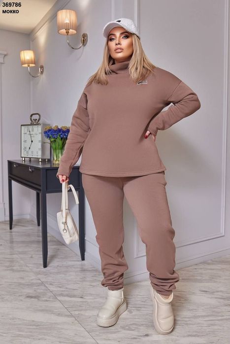 Костюми жіночі ..