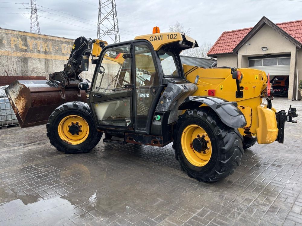 Ładowarka teleskopowa CATERPILLAR CAT TH407C maks wyposazenie