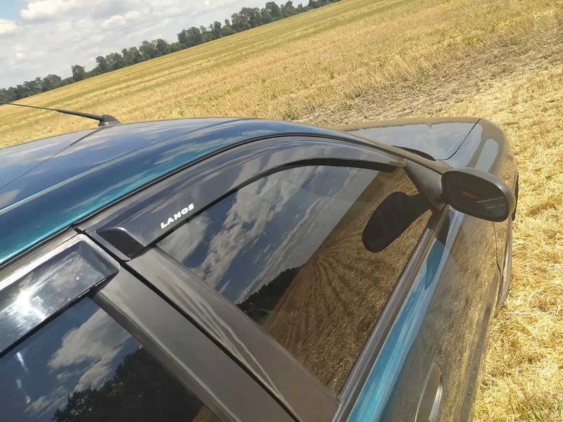 Дефлекторы окон DAEWOO Lanos (4 шт.) ветровики Деу Ланос