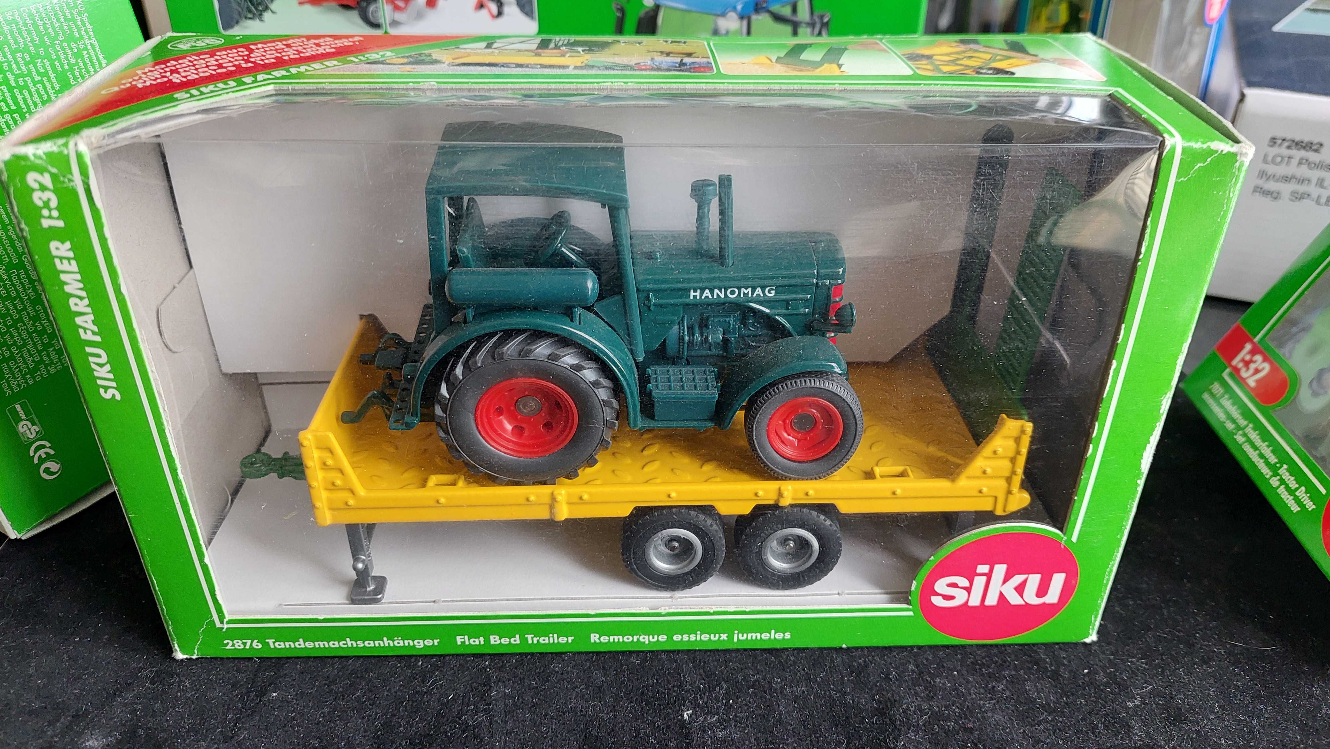 Siku 3464 Ciągnik Traktor Hanomag na przyczepie lawecie 1:32