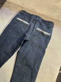 Spodnie jeansowe Reserved 146