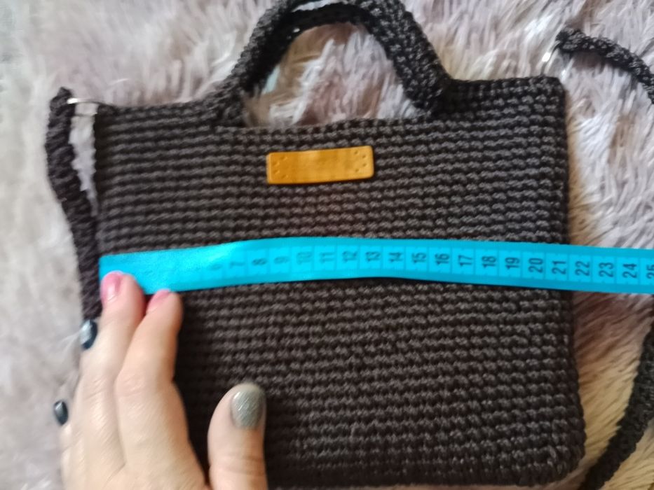 Нова коричнева на кнопці