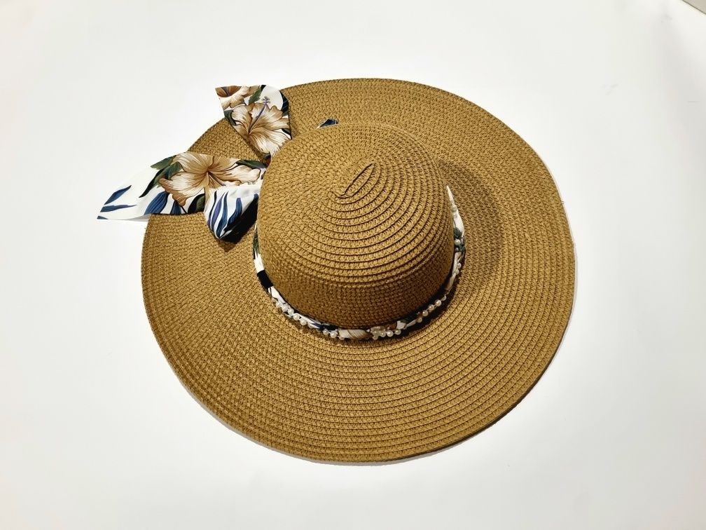 Beżowy plażowy kapelusz słomkowy roz. 56