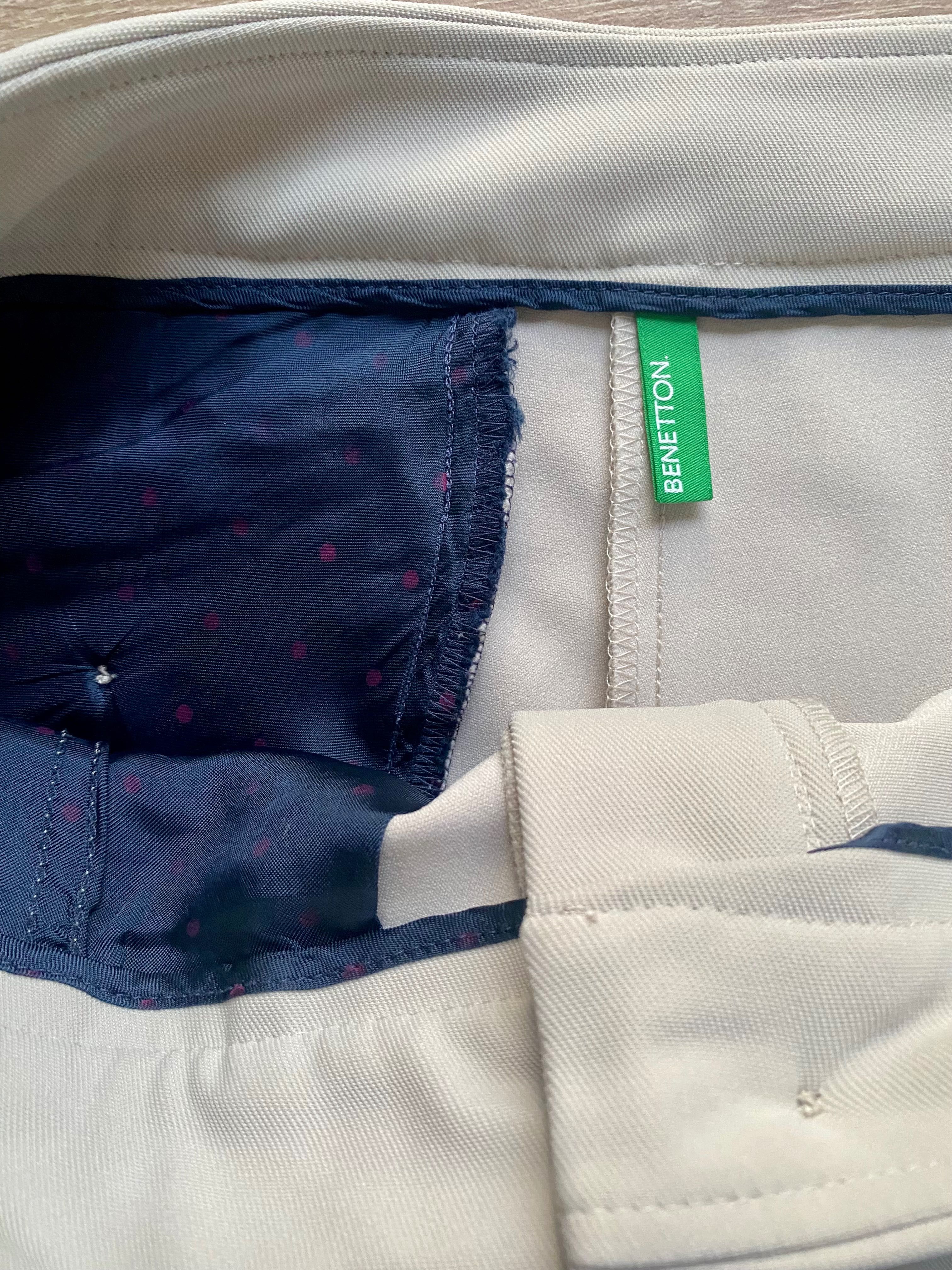 Kremowe spodnie United Colors of Benetton