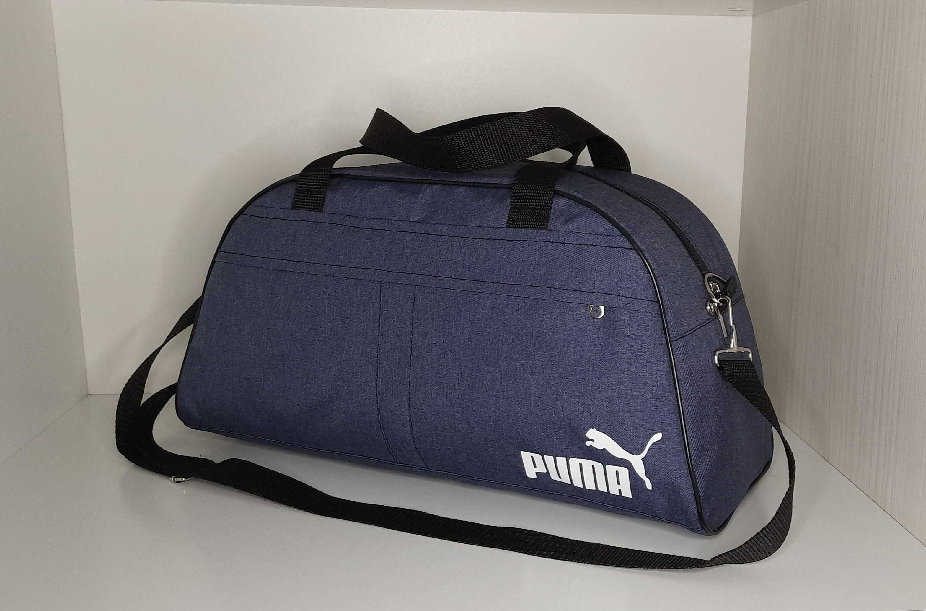 Новая качественная чёрная спортивная сумка Puma.