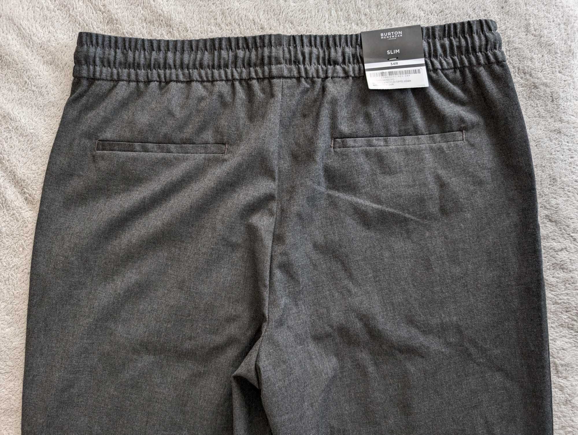 Nowe szare eleganckie spodnie joggery na gumie Burton Slim 34 R