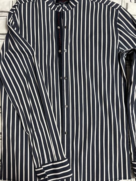 Стильна сорочка у смужку.