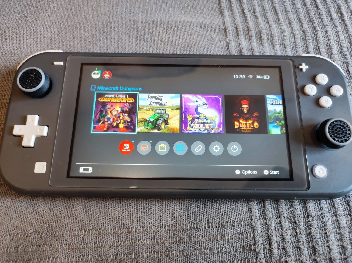 Nintendo Switch lite + gra oraz akcesoria
