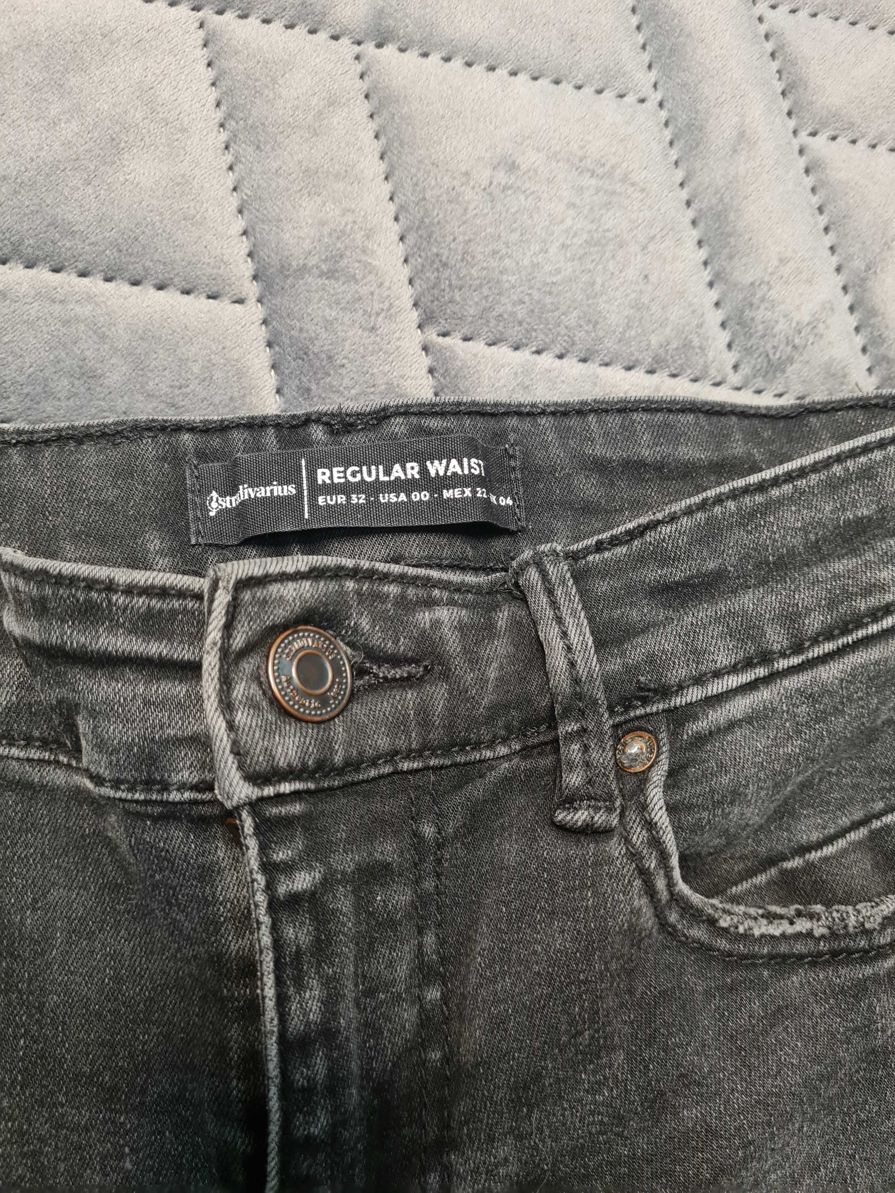 Spodnie skinny jeansy z dziurami Stradivarius rozmiar 32
